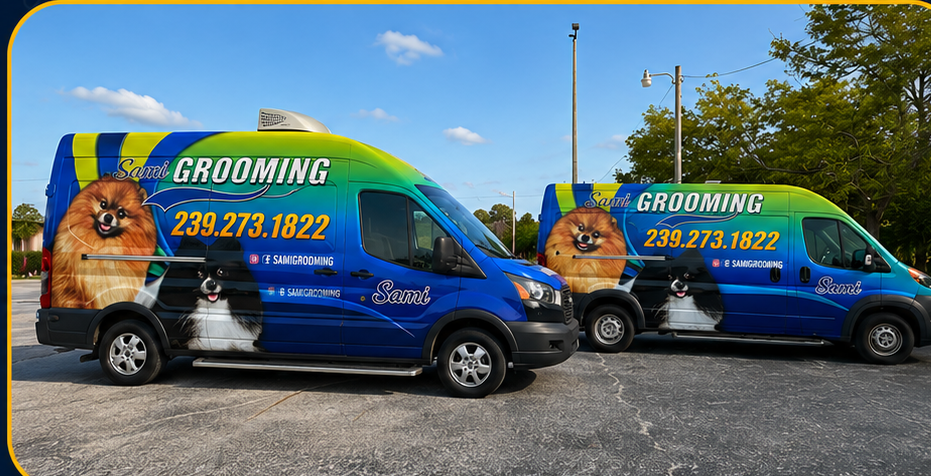 Sami standing between two Sami Grooming mobile pet grooming vans